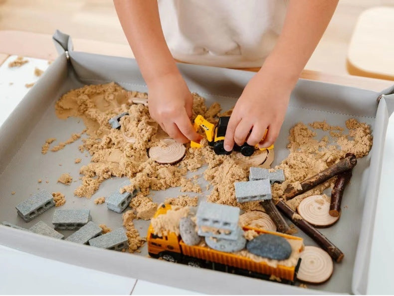 Bandeja sensorial Montessori totalmente plegada en plano para guardar sin ocupar espacio.